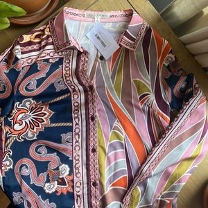 Retro Long sleeved shirt.  Brand New, never worn.  100% polyester